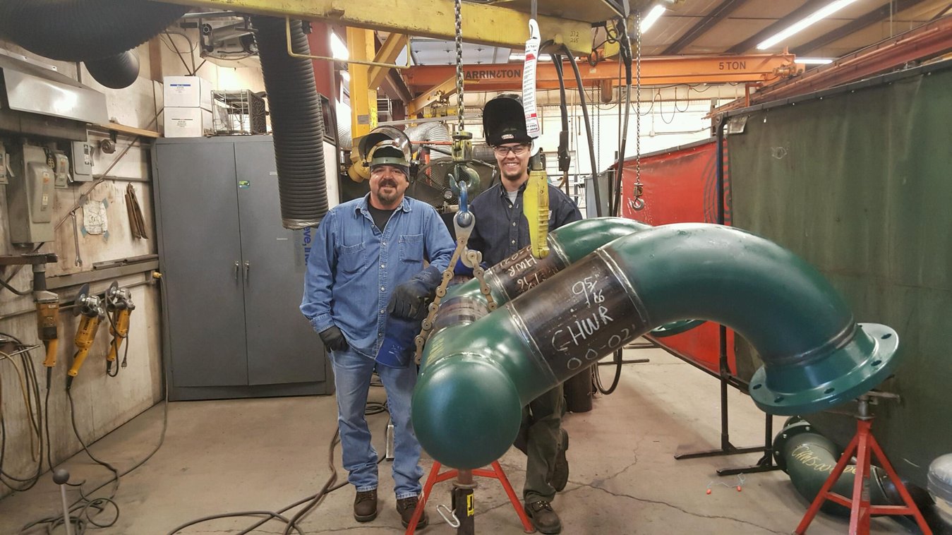 A UA VIP member receives instruction in the welding lab.