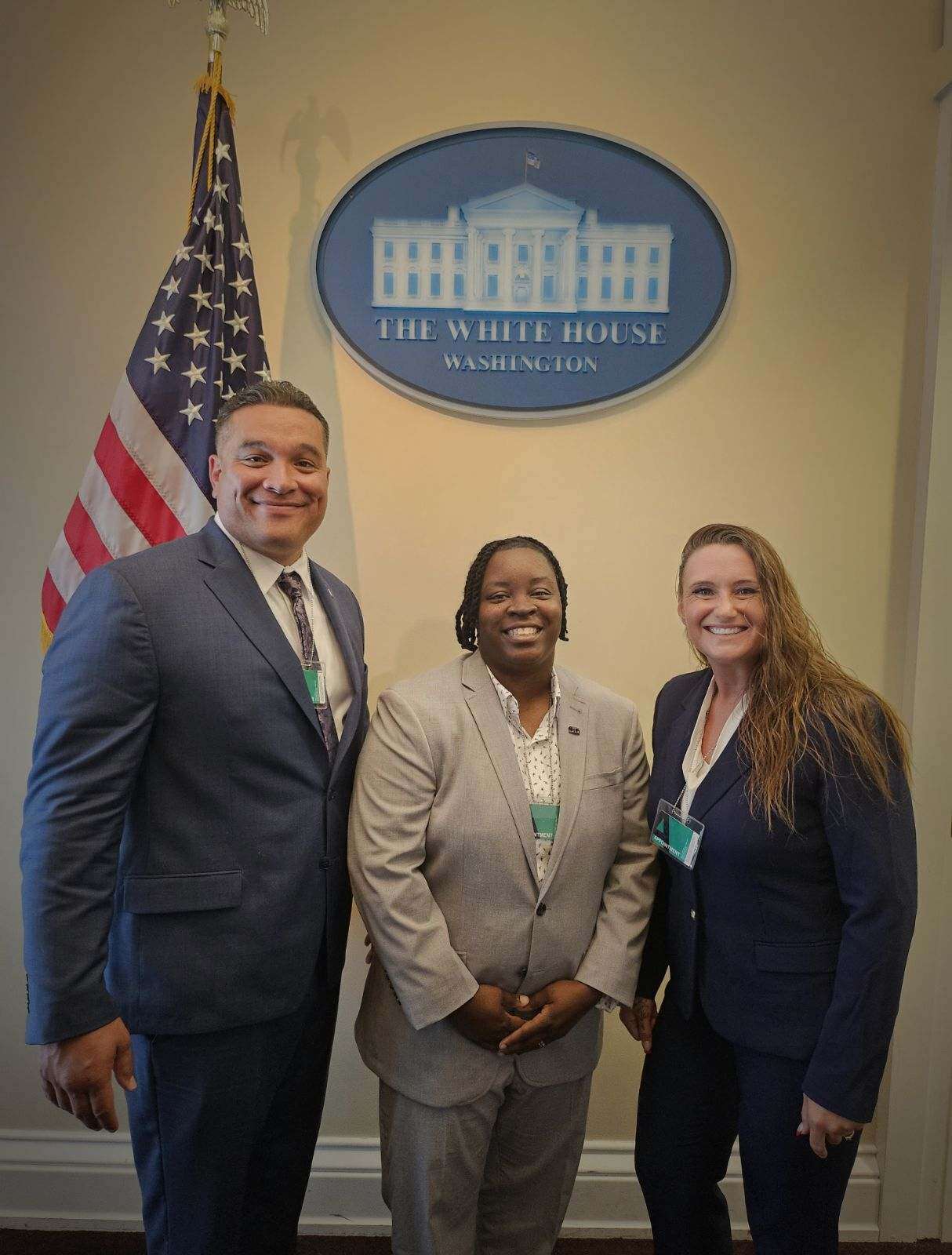 The three graduates at the White House.