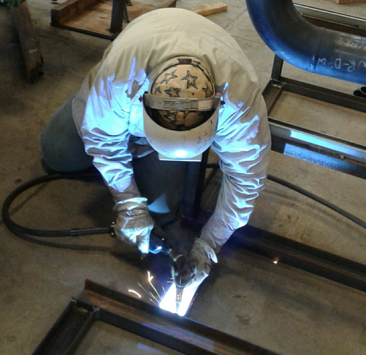 Travis Council tack welding steel frame